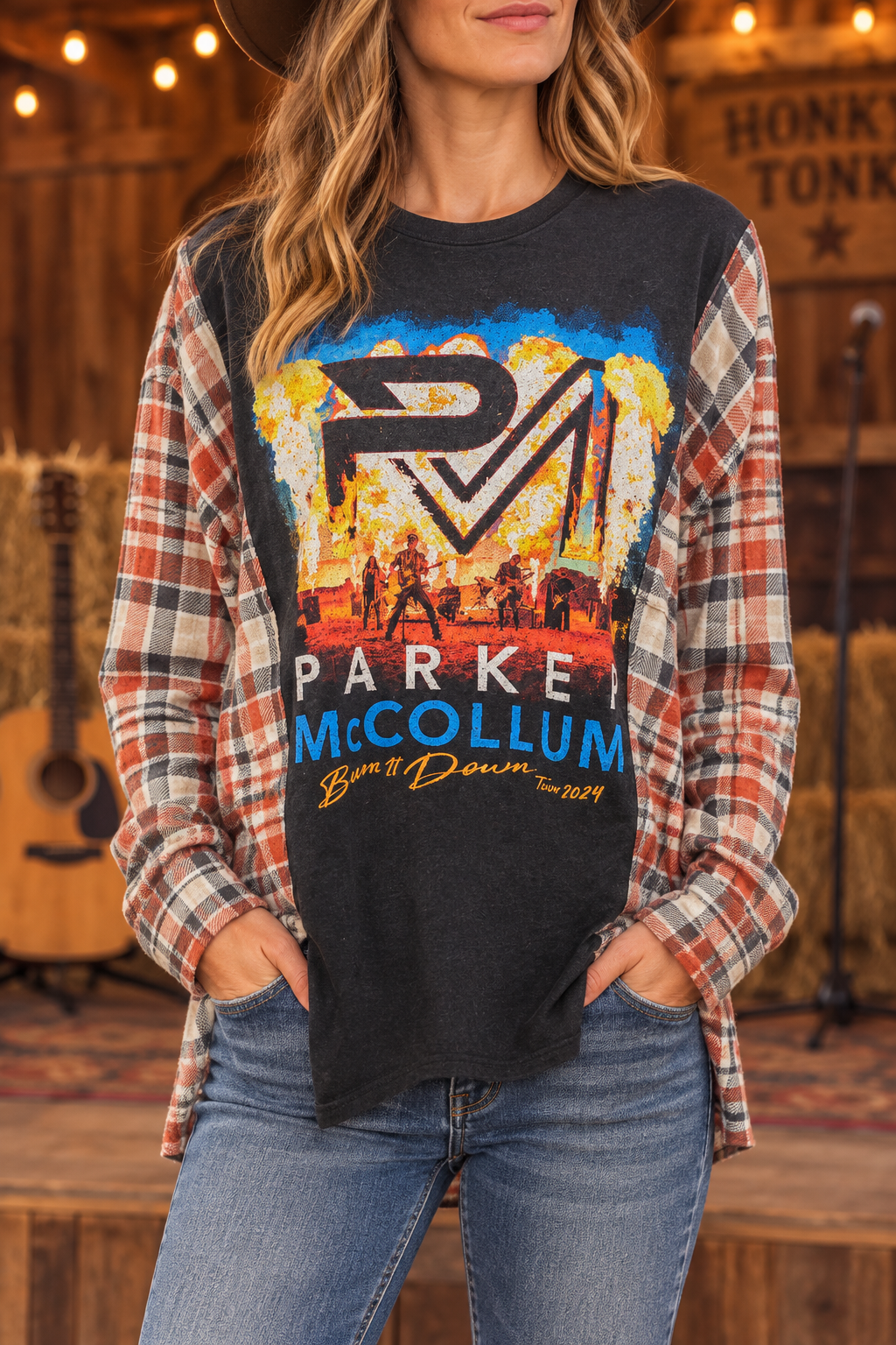 Model wearing the Parker McCollum upcycled flannel tee in a honky-tonk setting